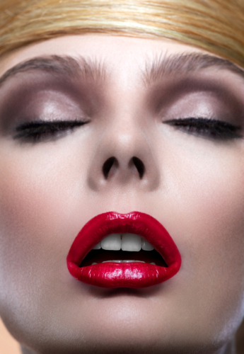 blond woman with red lipstick