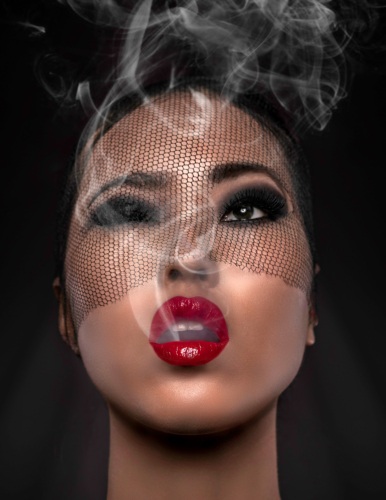 asian woman with red lipstick smoking