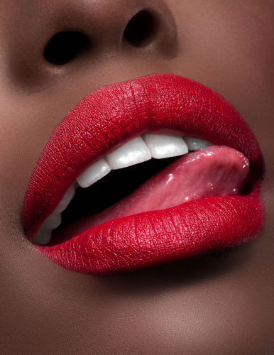 beautiful black woman with red lipstick tongue and teeth
