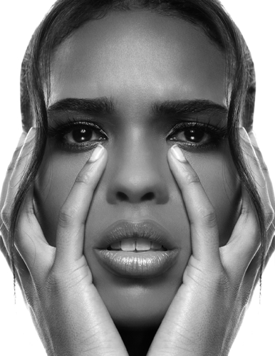 black and white photo of beautiful African American girl with hands on face