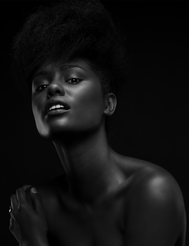 black and white photo of  beautiful African American girl with natural hair 